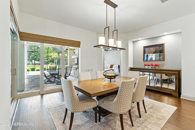 120 Hallowes Cv, Saint Johns, FL 32259 - dining space featuring hardwood / wood-style flooring and baseboards