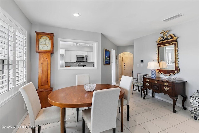91 San Juan Dr Unit H8, Ponte Vedra Beach, FL 32082 - dining area with arched walkways, baseboards, recessed lighting, light tile patterned floors, and a ceiling fan
