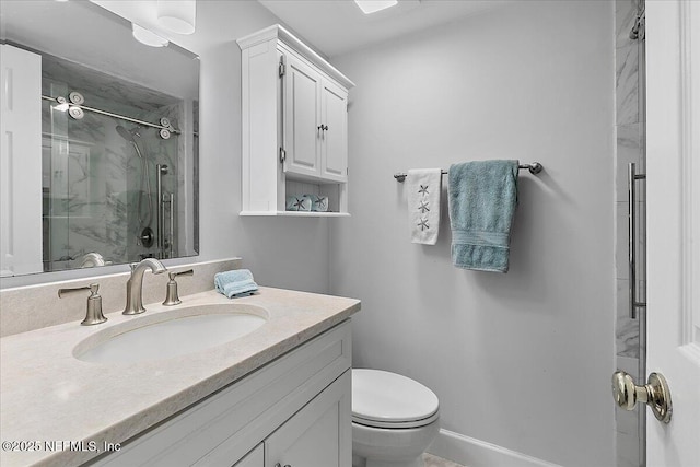 91 San Juan Dr Unit H8, Ponte Vedra Beach, FL 32082 - bathroom featuring a shower stall, toilet, and vanity
