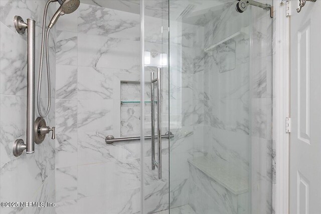 91 San Juan Dr Unit H8, Ponte Vedra Beach, FL 32082 - bathroom featuring a marble finish shower