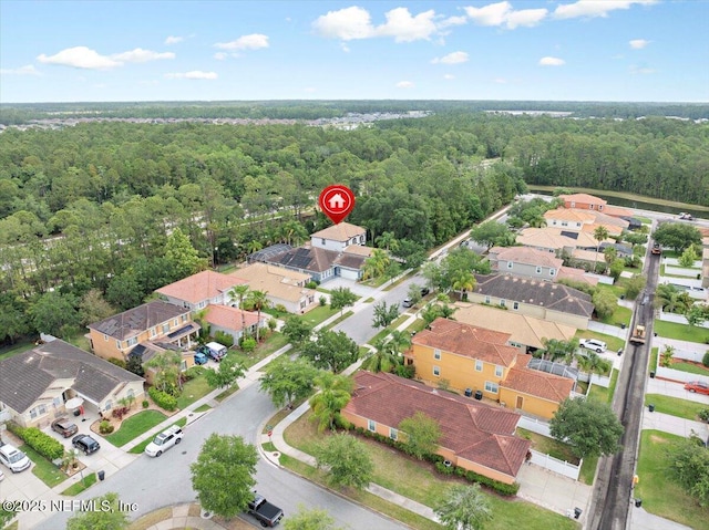 3357 Pegaso Ave, New Smyrna Beach, FL 32168 - aerial perspective of suburban area with a heavily wooded area
