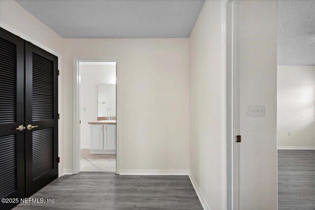 3357 Pegaso Ave, New Smyrna Beach, FL 32168 - hall featuring wood finished floors and baseboards