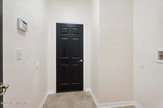 3357 Pegaso Ave, New Smyrna Beach, FL 32168 - entryway featuring light tile patterned flooring and baseboards