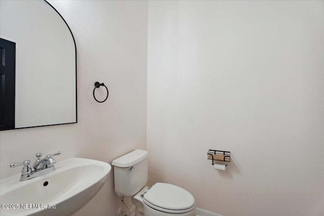 3357 Pegaso Ave, New Smyrna Beach, FL 32168 - bathroom featuring a sink and toilet
