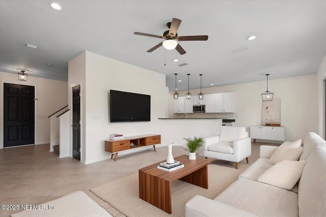 3357 Pegaso Ave, New Smyrna Beach, FL 32168 - living room with ceiling fan, recessed lighting, and light tile patterned floors