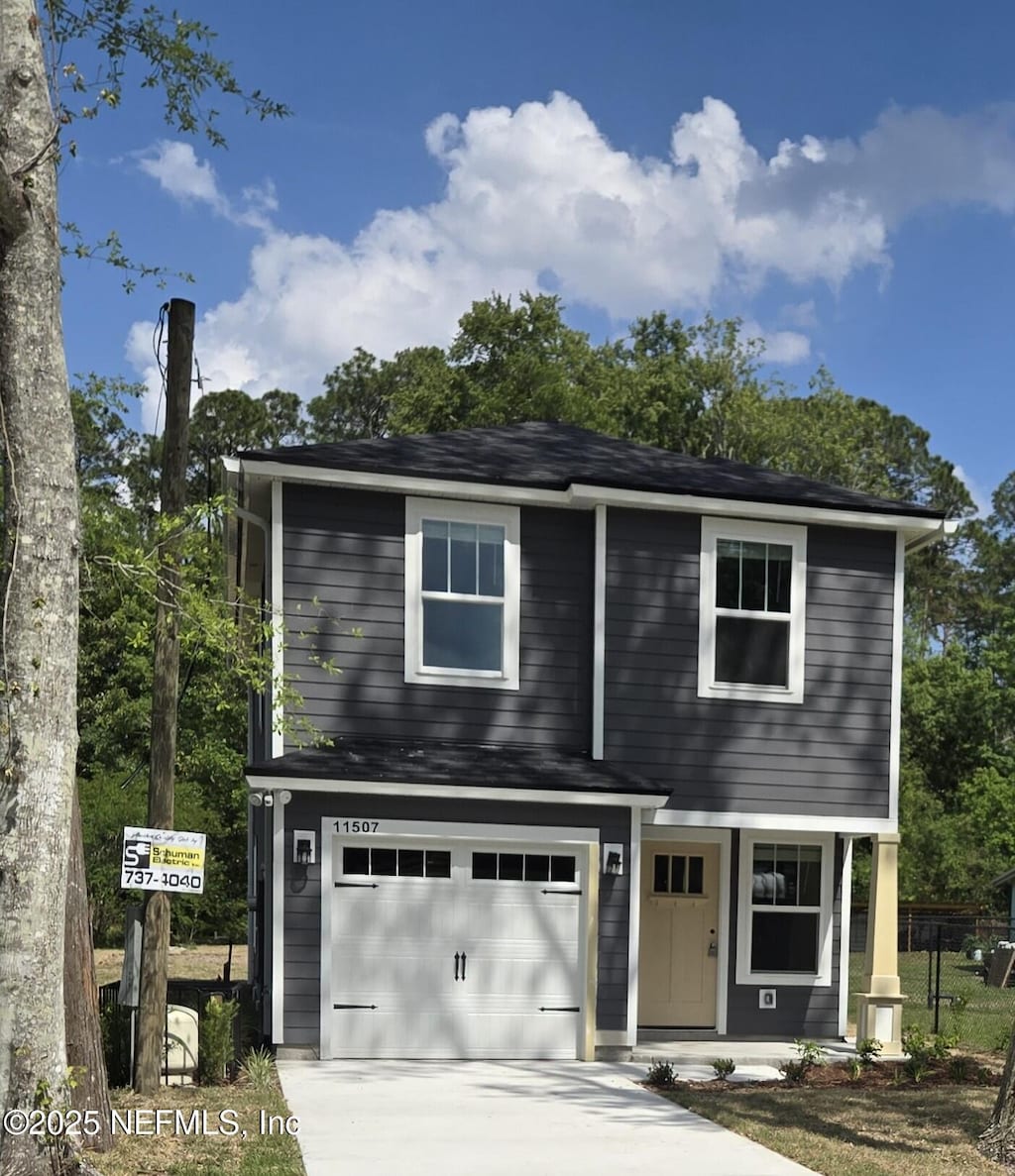 11503 Hobart Blvd, Jacksonville, FL 32218 - traditional-style house with a porch, concrete driveway, and a garage