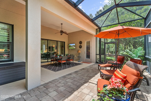 90 Canopy Glades Cir, Ponte Vedra, FL 32081 - view of patio featuring outdoor dining area, a ceiling fan, and glass enclosure