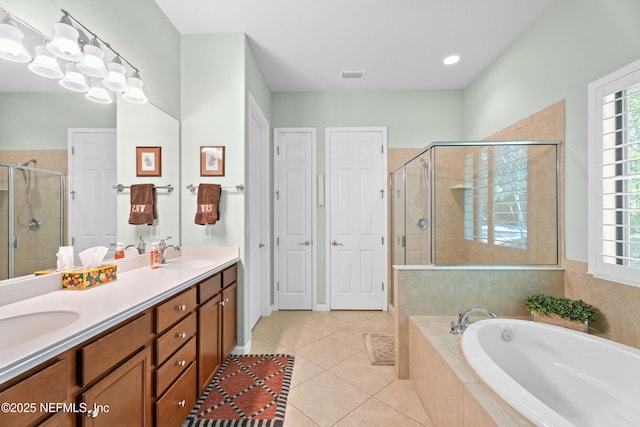 90 Canopy Glades Cir, Ponte Vedra, FL 32081 - full bathroom with a shower stall, a garden tub, tile patterned floors, double vanity, and healthy amount of natural light