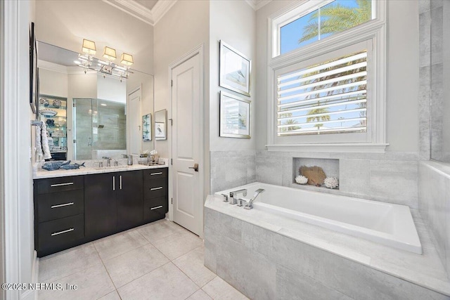 231 N Roscoe Blvd, Ponte Vedra Beach, FL 32082 - bathroom with ornamental molding, tile patterned floors, a garden tub, vanity, and a tile shower