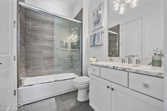 231 N Roscoe Blvd, Ponte Vedra Beach, FL 32082 - bathroom featuring toilet, enclosed tub / shower combo, and vanity