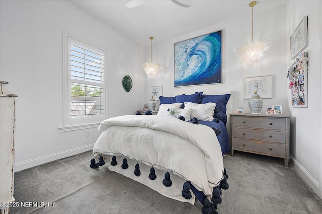 231 N Roscoe Blvd, Ponte Vedra Beach, FL 32082 - carpeted bedroom featuring a chandelier and baseboards