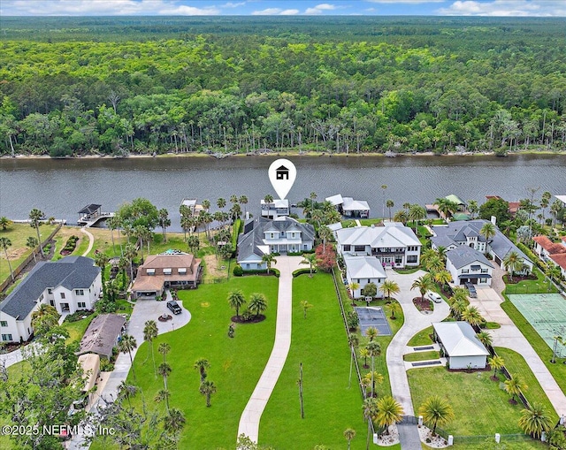 231 N Roscoe Blvd, Ponte Vedra Beach, FL 32082 - aerial perspective of suburban area with a heavily wooded area and a nearby body of water
