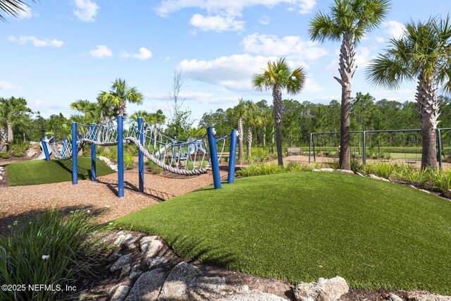 75556 Canterwood Dr, Yulee, FL 32097 - community play area with a lawn