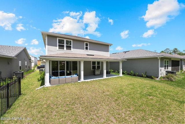 75556 Canterwood Dr, Yulee, FL 32097 - back of property with a patio, central AC unit, and roof with shingles