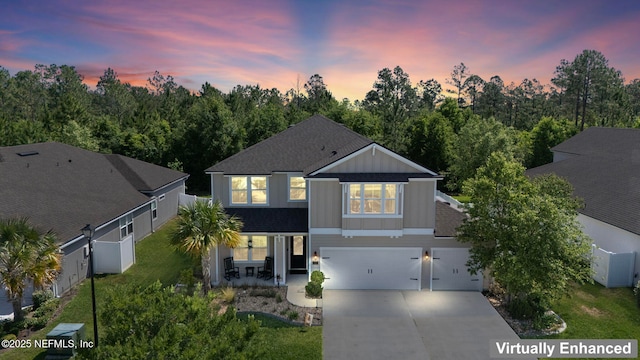2565 Cold Stream Ln, Green Cove Springs, FL 32043 - traditional-style home with concrete driveway, an attached garage, and roof with shingles