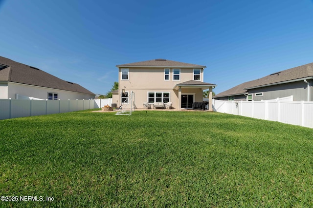 2565 Cold Stream Ln, Green Cove Springs, FL 32043 - rear view of house with a patio and stucco siding