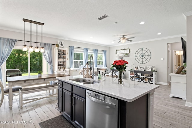 2565 Cold Stream Ln, Green Cove Springs, FL 32043 - kitchen with dishwasher, a sink, a ceiling fan, open floor plan, and light wood-style floors