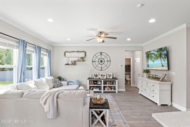 2565 Cold Stream Ln, Green Cove Springs, FL 32043 - living area featuring a ceiling fan, wood finished floors, baseboards, recessed lighting, and ornamental molding