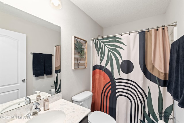 2565 Cold Stream Ln, Green Cove Springs, FL 32043 - bathroom featuring a textured ceiling, vanity, toilet, and curtained shower