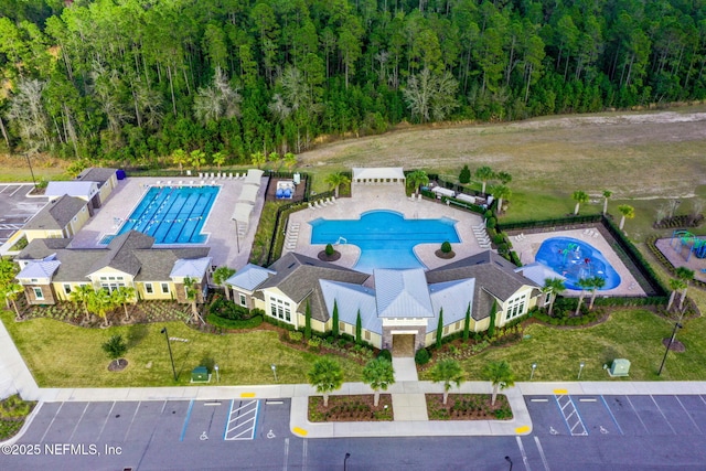 2565 Cold Stream Ln, Green Cove Springs, FL 32043 - bird's eye view of a pool and a forest