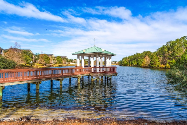 dock area featuring a gazebo and a water view