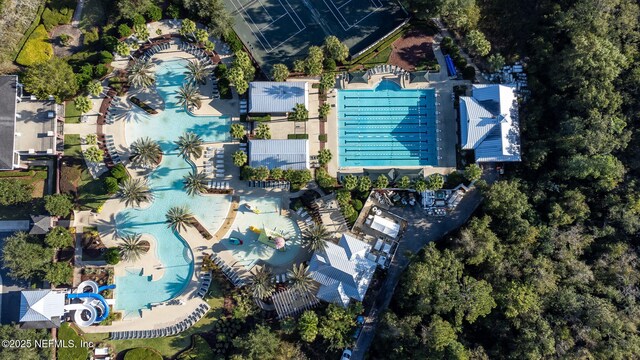 drone / aerial view of a pool