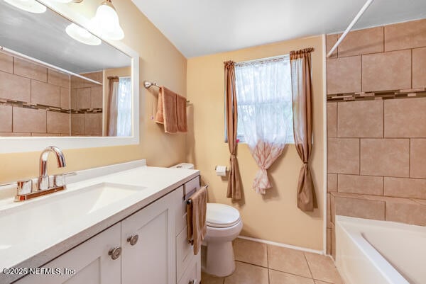 2760 Jerry Ln, Jacksonville, FL 32218 - full bath with tile patterned floors, toilet, vanity, and shower / bath combo