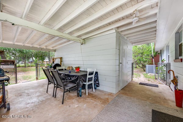 2760 Jerry Ln, Jacksonville, FL 32218 - view of patio / terrace featuring outdoor dining area, a gate, and fence