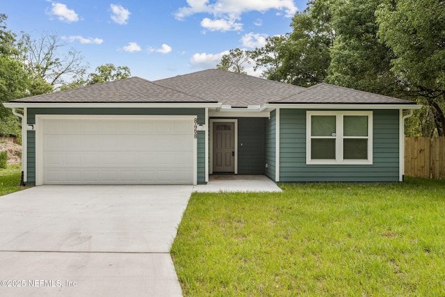 8468 Buttercup St, Jacksonville, FL 32210 - ranch-style home featuring driveway, an attached garage, and a shingled roof