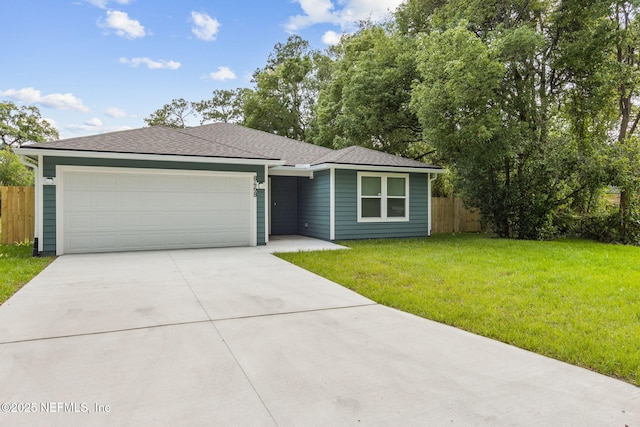 8468 Buttercup St, Jacksonville, FL 32210 - view of front of home with driveway and a garage