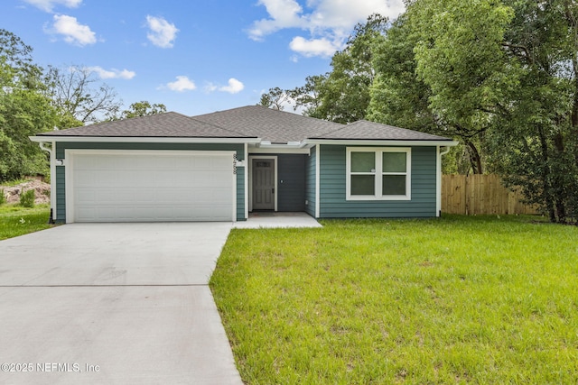 8468 Buttercup St, Jacksonville, FL 32210 - view of front facade featuring driveway, a garage, and a shingled roof