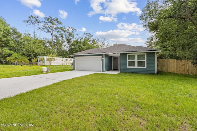8468 Buttercup St, Jacksonville, FL 32210 - view of front of house featuring a garage, concrete driveway, and a shingled roof