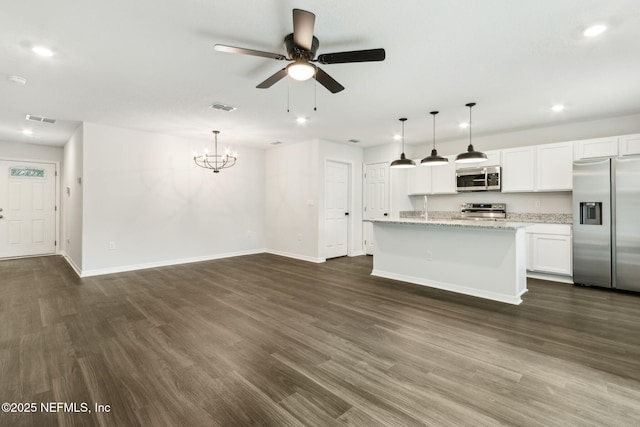 8468 Buttercup St, Jacksonville, FL 32210 - unfurnished living room featuring ceiling fan, recessed lighting, baseboards, and dark wood-style flooring