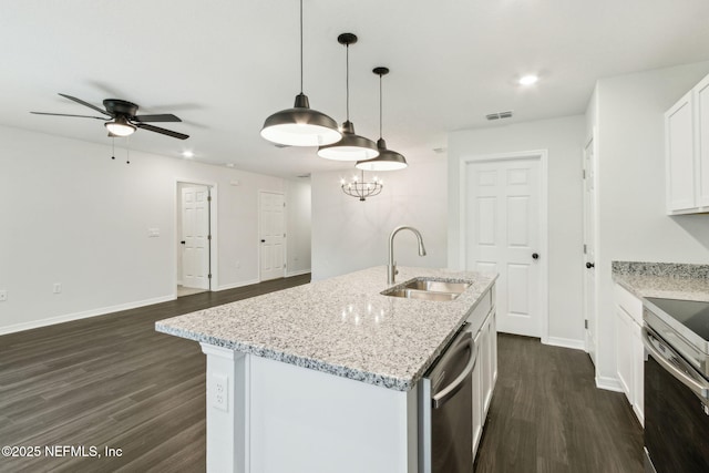 8468 Buttercup St, Jacksonville, FL 32210 - kitchen featuring a sink, stainless steel appliances, dark wood-style floors, ceiling fan, and baseboards