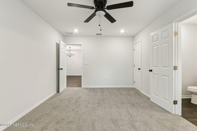 8468 Buttercup St, Jacksonville, FL 32210 - unfurnished room featuring a ceiling fan, a chandelier, carpet floors, baseboards, and recessed lighting