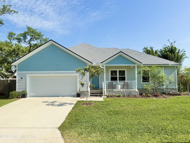 330 Trade Wind Ln, Saint Augustine, FL 32080 - view of front facade with a porch, a garage, and concrete driveway