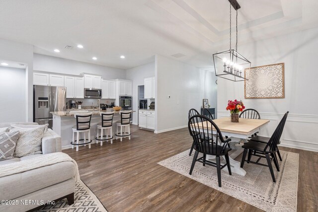 1309 Foxmeadow Trl, Middleburg, FL 32068 - dining space featuring dark wood-style floors, a chandelier, baseboards, and recessed lighting