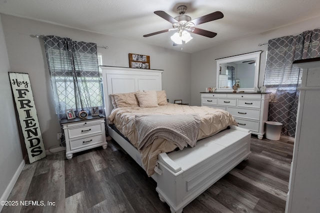 bedroom featuring dark wood-type flooring and ceiling fan