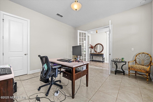 71 Lansing Ct, Saint Augustine, FL 32092 - office featuring baseboards, light tile patterned floors, and a textured ceiling