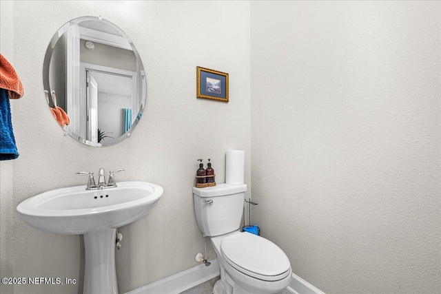 71 Lansing Ct, Saint Augustine, FL 32092 - bathroom with toilet and baseboards