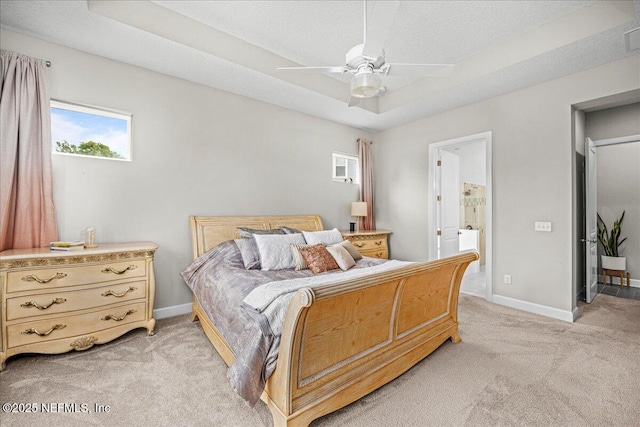 71 Lansing Ct, Saint Augustine, FL 32092 - bedroom featuring light colored carpet, baseboards, ensuite bathroom, a textured ceiling, and ceiling fan
