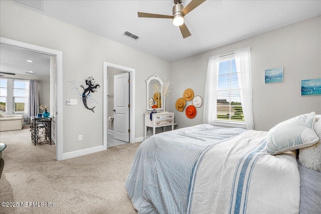 71 Lansing Ct, Saint Augustine, FL 32092 - carpeted bedroom featuring baseboards, a textured ceiling, and ceiling fan