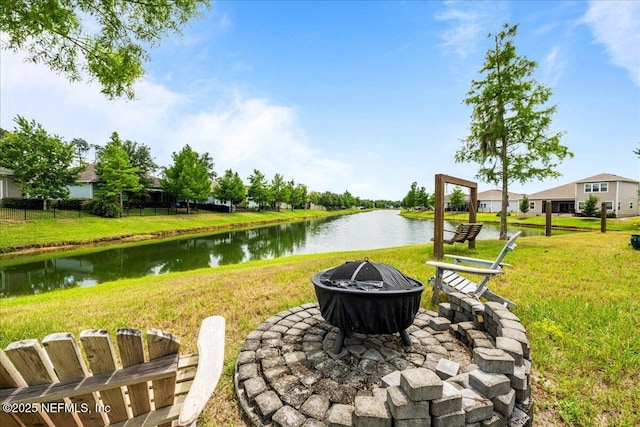 71 Lansing Ct, Saint Augustine, FL 32092 - view of community featuring a fire pit, a yard, and a water view