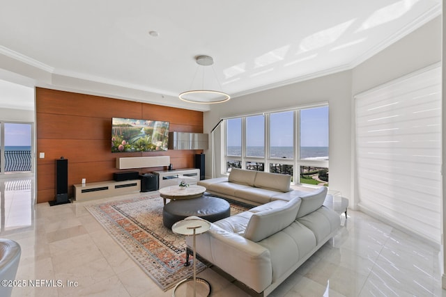 living room featuring ornamental molding and light marble finish flooring