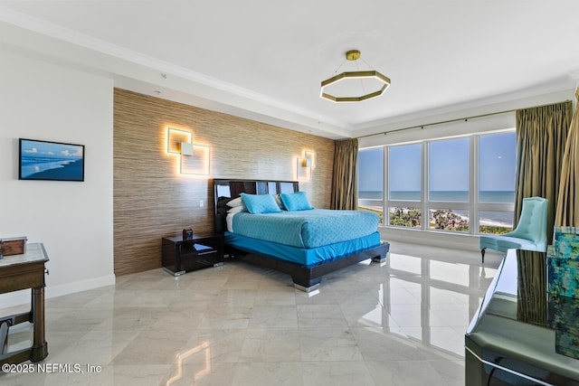 bedroom featuring baseboards, light marble finish flooring, a water view, and crown molding