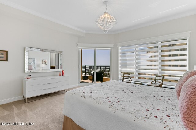 bedroom featuring access to outside, carpet floors, and baseboards