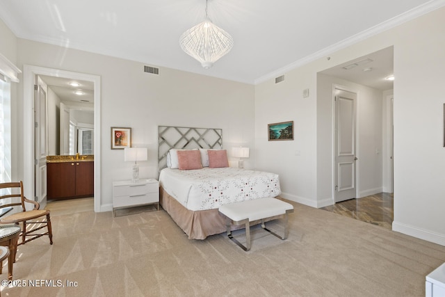 bedroom with light carpet, ornamental molding, baseboards, and connected bathroom