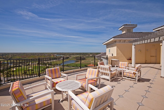 view of patio / terrace with an outdoor hangout area and a water view