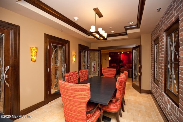 dining room featuring a raised ceiling, baseboards, a chandelier, recessed lighting, and light tile patterned flooring