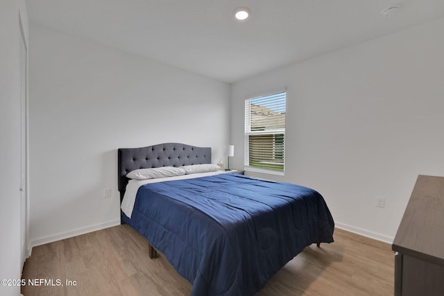 2304 Shady Breeze Ln, Green Cove Springs, FL 32043 - bedroom featuring wood finished floors and baseboards